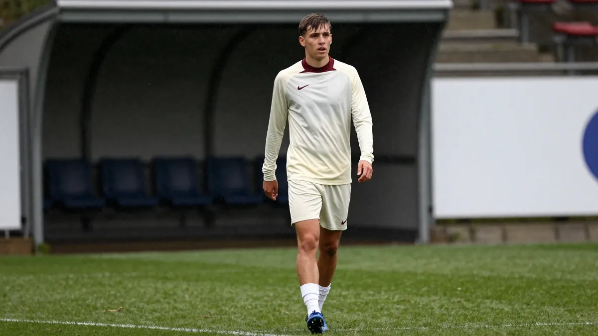 Tamworth FC's new away kit for the 2026-27 season has been released, featuring an off-white design with maroon accents...